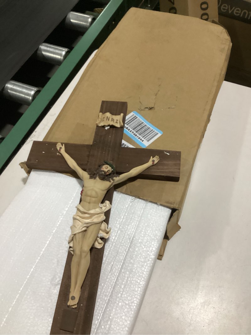 Condition photo showing As Is for **jesus not attached to the cross** (jesus foot is broken)ennas large wall crucifix with resin jesus figurine 19 inch wooden cross with metal hook handcrafted religious wall decor for home, church, or prayer room christian catholic gift 19.1\"l x 10\"w brown