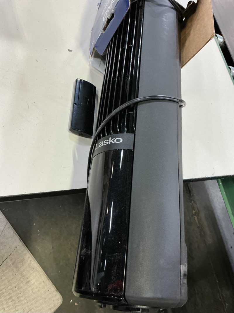 Condition photo showing As Is for lasko 42” oscillating 12-speed dc tower fan with remote