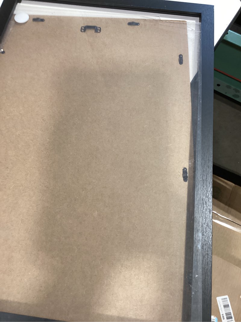 Condition photo showing As Is for MCS Studio Gallery 12x18 Picture Frame Black Woodgrain Engineered Wood, Rectangle Photo Frame for Photos, Posters & Art Prints (1-Pack) 1-Pack Black Woodgrain 12x18