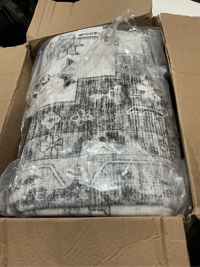 Condition photo showing Good Condition for syalife 6x9 washable area rug, ultra soft non-slip, low pile, stain resistant vintage area rug for living room, boho carpet for bedroom, dining room, office, foldable home decor rug, dark grey/white 6' x 9' (rectangular) a-dark grey/white