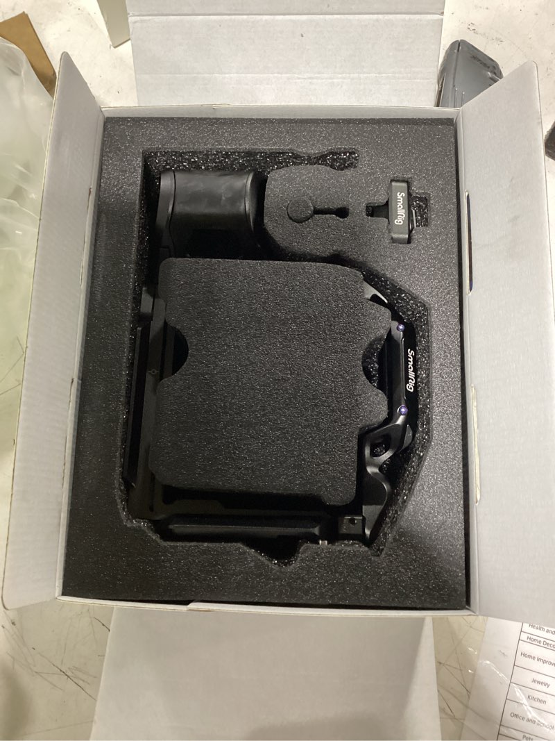 Condition photo showing New/Like New for smallrig rhinoceros camera cage for sony a7r v/ a7 iv/ a7s iii | cable clamp, multiple accessory mounting points, and a built-in quick-release plate.