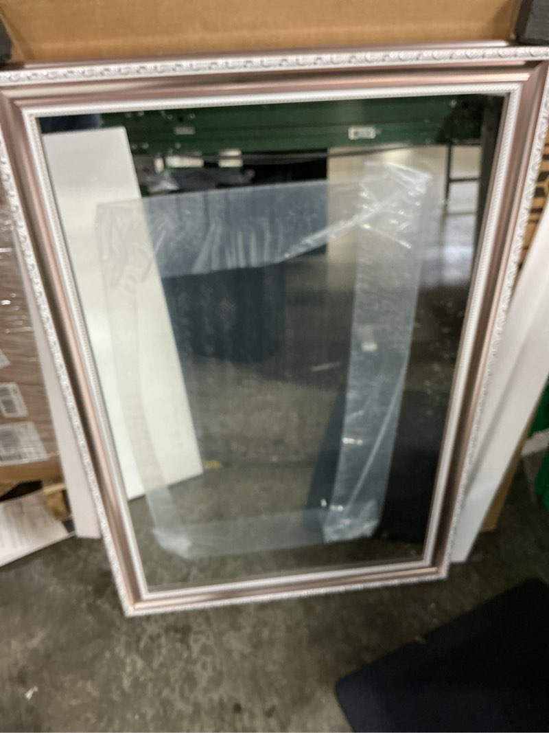 Condition photo showing New/Like New for rolove 24x34 inch brushed rose gold frame mirror for wall, ornate baroque wall mirror, large vintage decorative mirror for mantel & bathroom, waterproof frame, tempered glass (champagne pink hue) champagne pink 24"l x 34"w