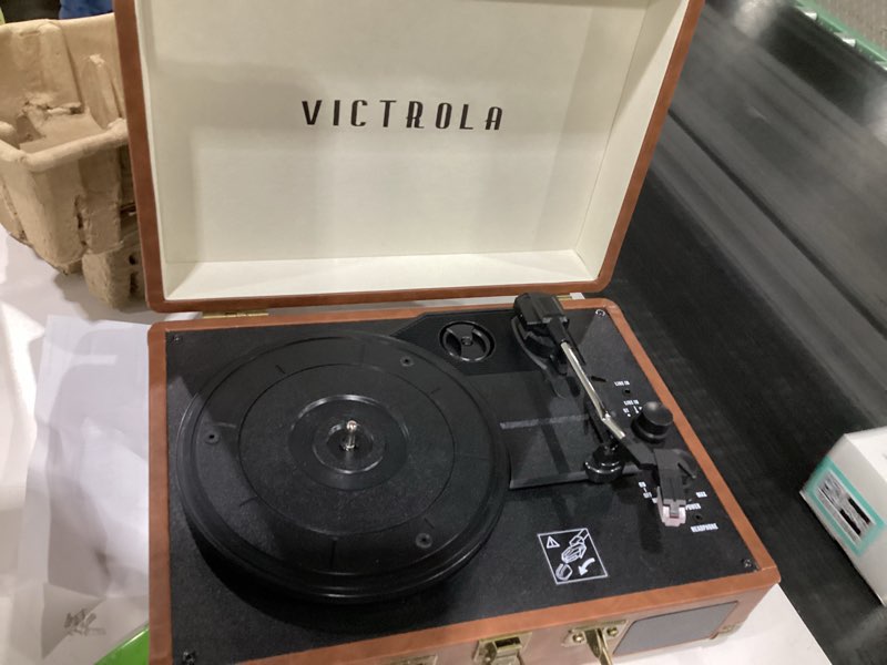 Condition photo showing As Is for Victrola Journey Bluetooth Portable Suitcase Record Player – with Built-in Speakers, 3 Speed Vinyl Record Player, RCA Out, Headphone Jack (Brown)