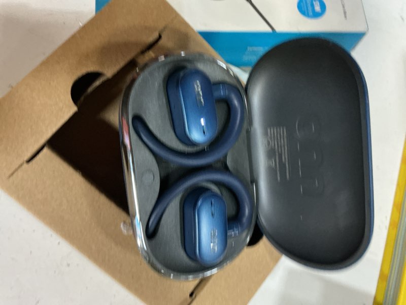 Condition photo showing New/Like New for onn. wireless open-ear earphones with environmental noise cancellation microphones & charging case, blue
