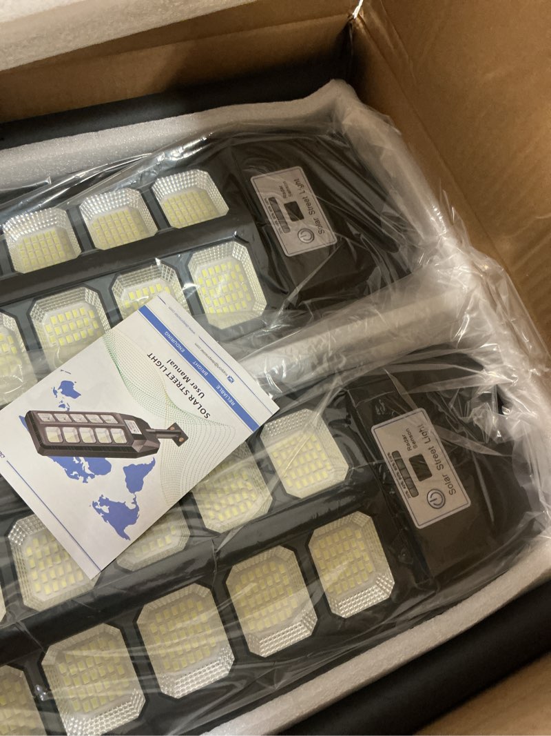 Condition photo showing Good Condition for Solar Lights Outdoor, IP66 Waterproof Street Lights Outdoor, 6500K Dusk to Dawn Solar Security Flood Lights Motion Sensor with Remote Control for Yard, Entryway Garage, Porch 4 Pack