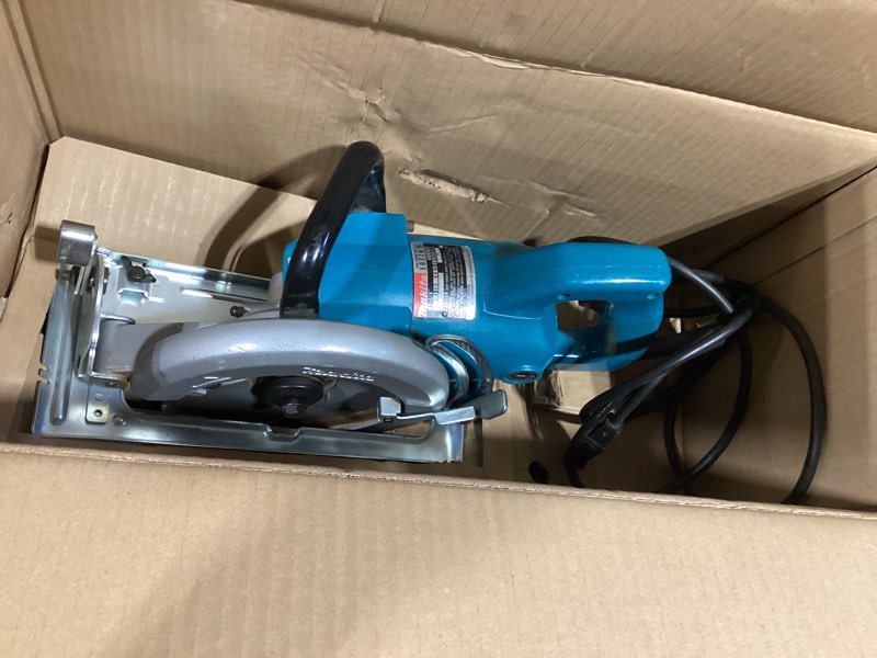 Condition photo showing As Is for makita 5477nb 7-1/4" hypoid saw