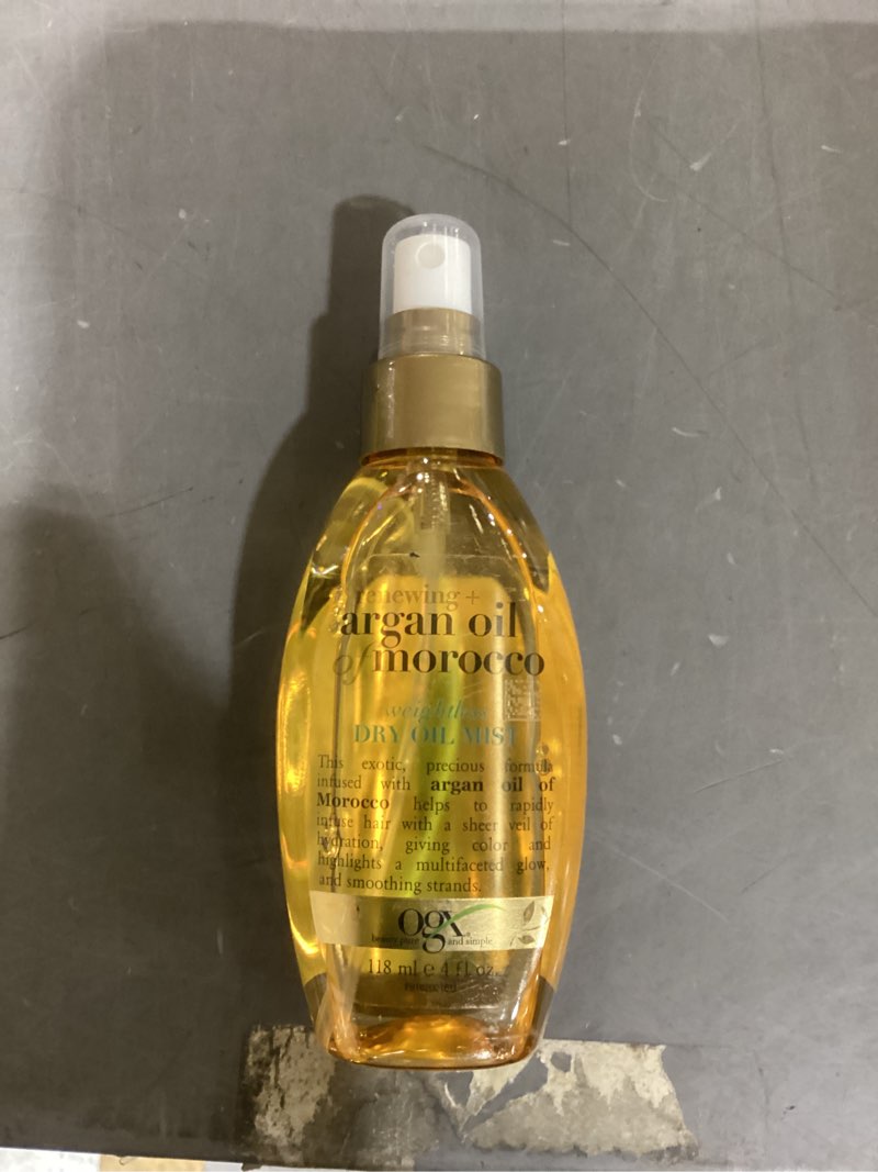 Condition photo showing New/Like New for ogx renewing + argan oil of morocco weightless healing dry oil lightweight hair oil mist - 4 fl oz