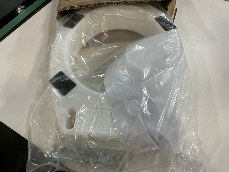 Condition photo showing Good Condition for Carex Toilet Seat Riser, Round Raised Toilet Seat Adds 3.5 inches to Toilet Height, for Assistance Bending or Sitting, 300 Pound Weight Capacity Toilet Riser