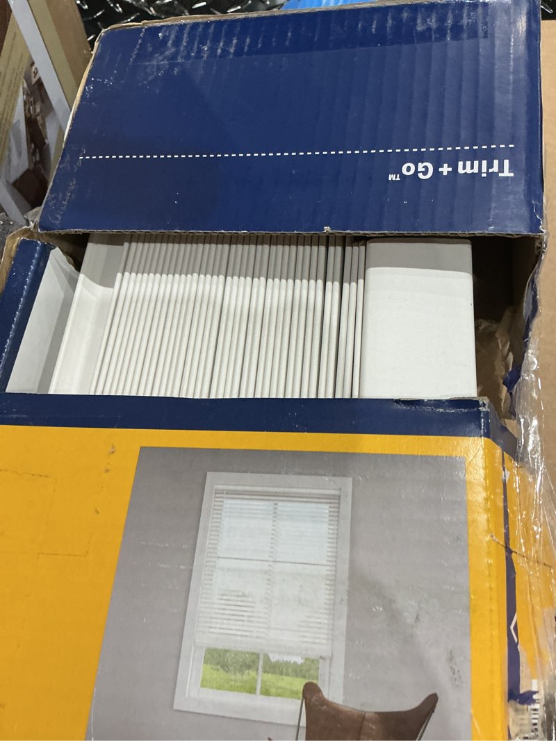 Condition photo showing New/Like New for faux wood blind white