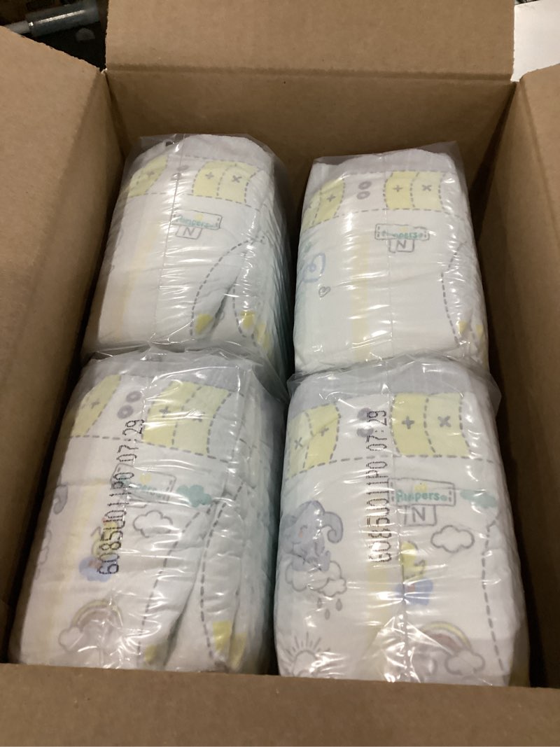 Condition photo showing New/Like New for pampers swaddlers diapers, size 0 (up to 10 lbs), 84 count, absorbent, keeps baby dry and comfortable, skin safe disposable baby diaper (packaging may vary) newborn 84
