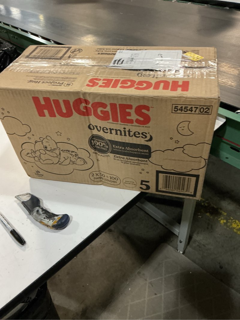 Condition photo showing New/Like New for huggies size 5 overnites baby diapers: overnight diapers, size 5 (27+ lbs), 100 ct (2 packs of 50), packaging may vary
