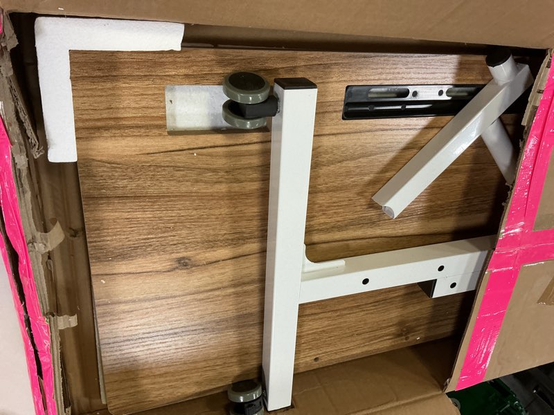 Condition photo showing As Is for SIDUCAL Standing Desk Height Adjustable with Tiltable Tabletop, Rolling Laptop Desk with Charging Station, Sit Stand Portable Stand Up Desk with Wheels, Vintage Oak Vintage Oak 15.74"D x 31.49"W