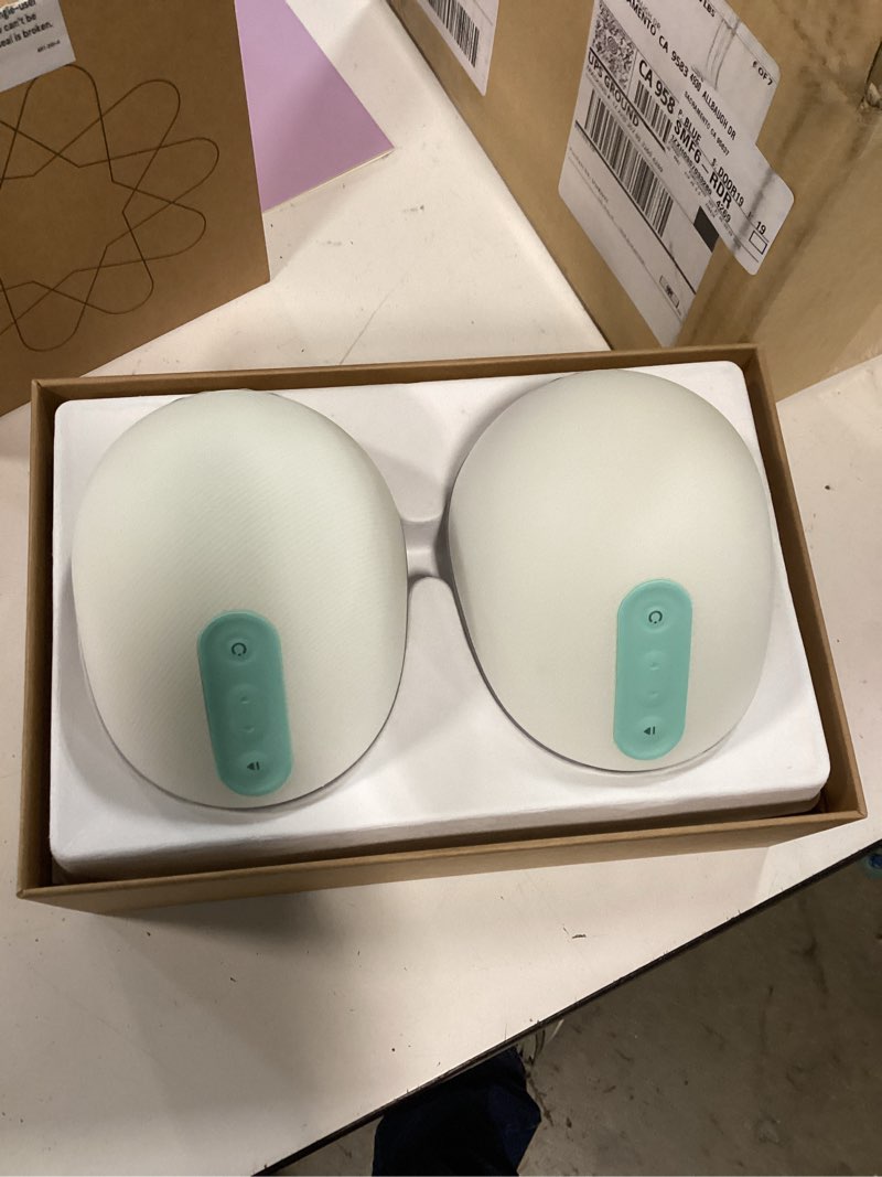 Condition photo showing As Is for willow go wearable breast pump, double electric breast pump, cordless, hands free breast pump with 9 levels of hospital grade suction strength, app compatible & fits fully in bra, 21mm & 24mm flange clear
