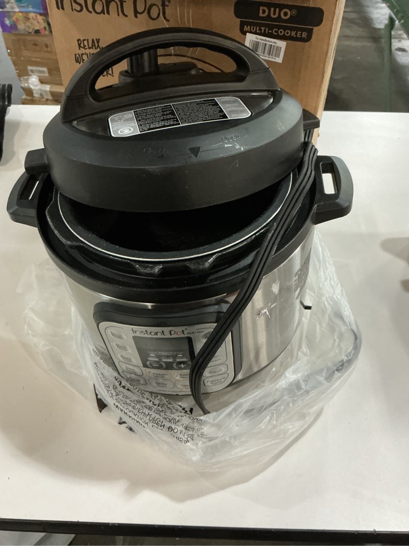 Condition photo showing As Is for Instant Pot Duo 7-in-1 Mini Electric Pressure Cooker, Slow Rice Cooker, Steamer, Sauté, Yogurt Maker, Warmer & Sterilizer, Includes Free App with over 1900 Recipes, Stainless Steel, 3 Quart