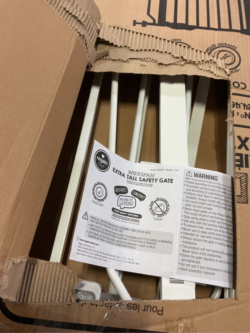 Condition photo showing As Is for regalo safety 36" extra tall and 49" wide baby gate for doorways & bottom of stairs, pressure mounted walk through baby gate for toddlers & pets, tested & safe, american designed, american owned white 29-49"w x 36"h