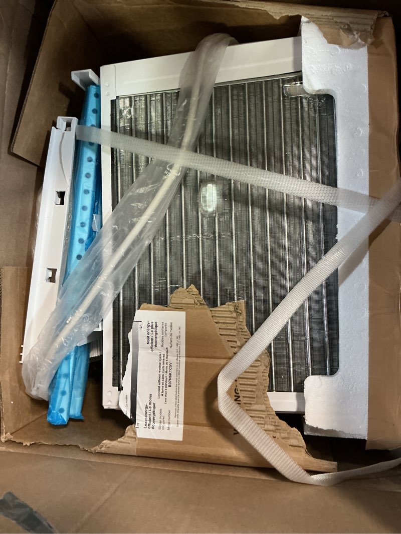 Condition photo showing As Is for amazon basics 5000-btu window air conditioner with quiet operation, up to 150 sqf, cool and fan functions, washable filter, adjustable window kit, intuitive mechanical controls, for small room, white white 5000 btu