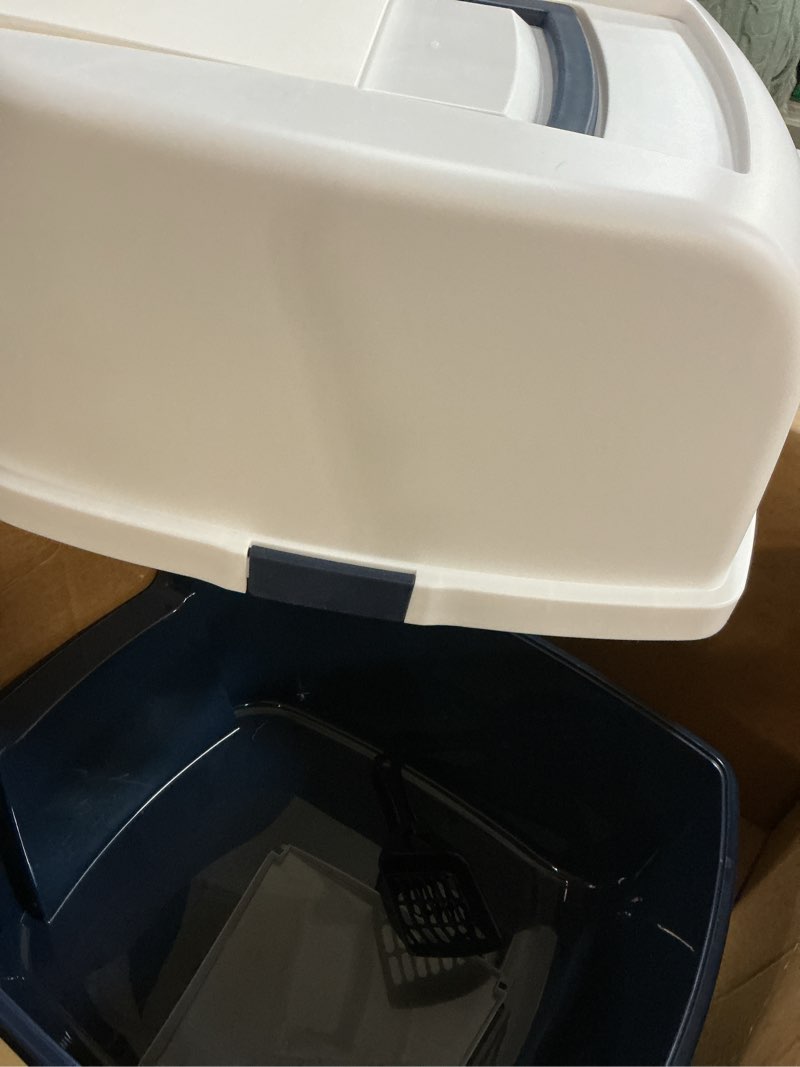 Condition photo showing Good Condition for iris usa cat litter box, large enclosure with front door flap and scoop, covered box with handle and buckles for portability and privacy, navy/white