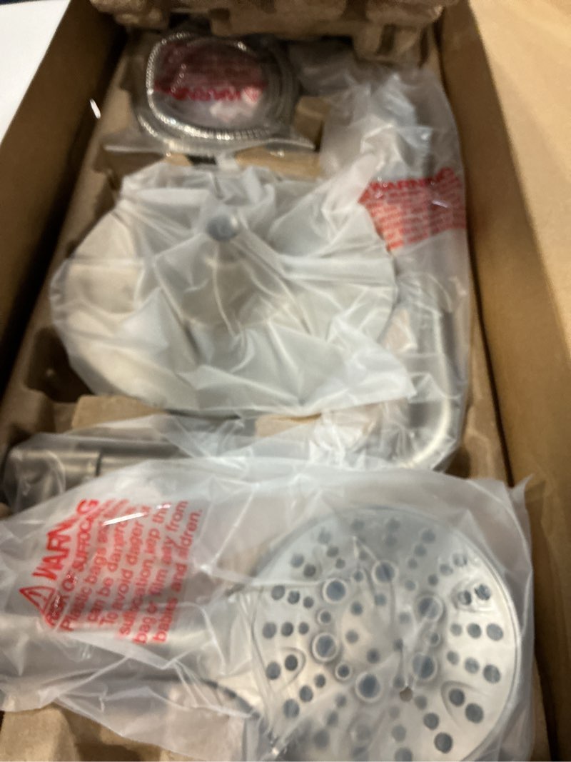 Condition photo showing Good Condition for bright showers rain system including 9 inch rainfall shower head and handheld with height adjustable holder, solid brass rail and 60 inch long stainless steel shower hose