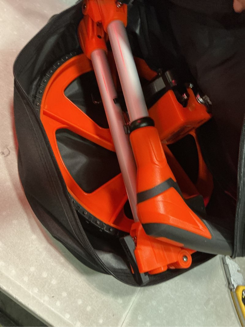 Condition photo showing Good Condition for zozen distance measuring wheel, measure wheel in feet and inches, collapsible/mechanical/one key to reset/kickstand to keep stand/starting point arrow and carrying bag, adapt to various roads.