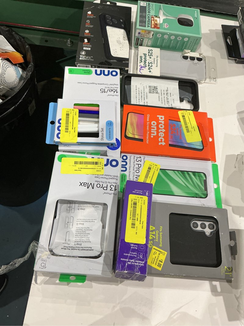 Condition photo showing As Is for assorted cellphone/tablet/laptop case covers & accessories