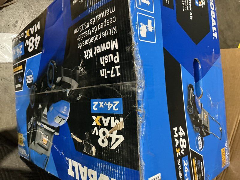 Condition photo showing As Is for kobalt 48v max (24vx2) 17-in push mower kit, (2) 4.0ah batteries and charger included