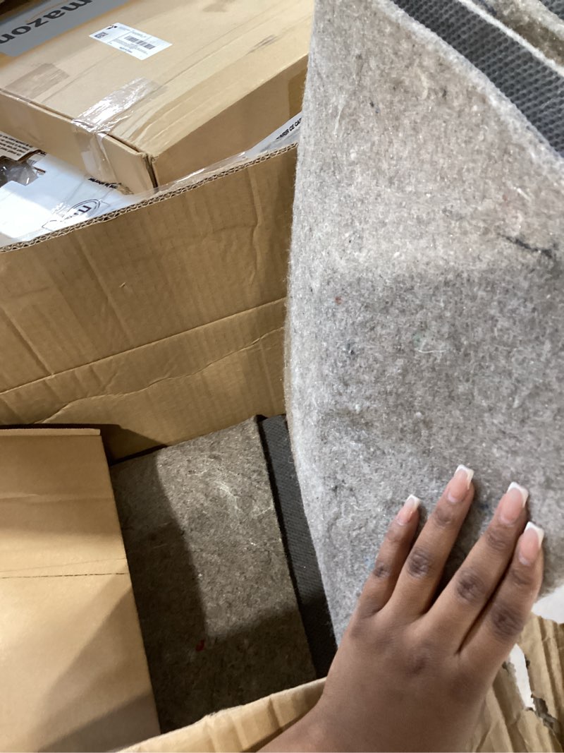 Condition photo showing Good Condition for mohawk home non slip rug pad 4' x 6' (rectangular)- 1/4" thick felt + latex rubber gripper - dual surface cushion for hardwood, carpet, tile floors, made in usa 1/4 inch dual surface rug pad 4' x 6' (rectangular)