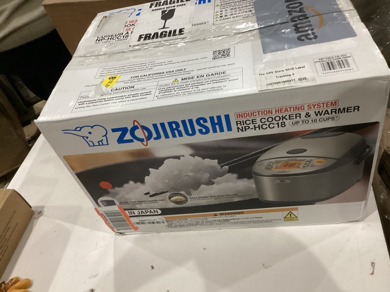 Condition photo showing New/Like New for Zojirushi NP-HCC18XH Induction Heating System Rice Cooker and Warmer, 1.8 L, Stainless Dark Gray Stainless Dark Gray 1.8 L / 10 cups uncooked rice Rice Cooker