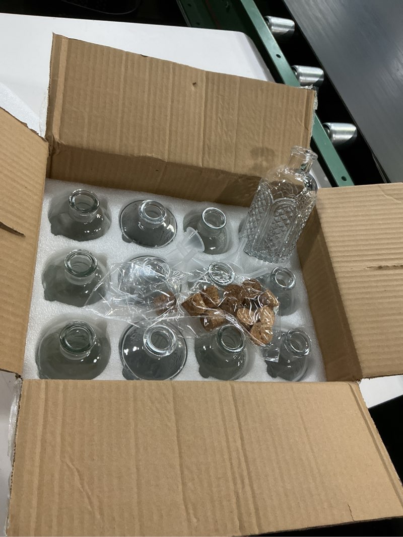 Condition photo showing New/Like New for 12 pack 6oz glass bottles with cork stoppers, 200ml clear glass liquor bottles with 4 vintage patterns, refillable whiskey bottles for wine, oil, vinegar, kombucha, wedding favors clear 4 patterns