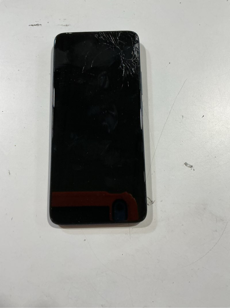Condition photo showing As Is for for parts only verizon prepaid tcl k33, 5g, 64gb, space gray - prepaid