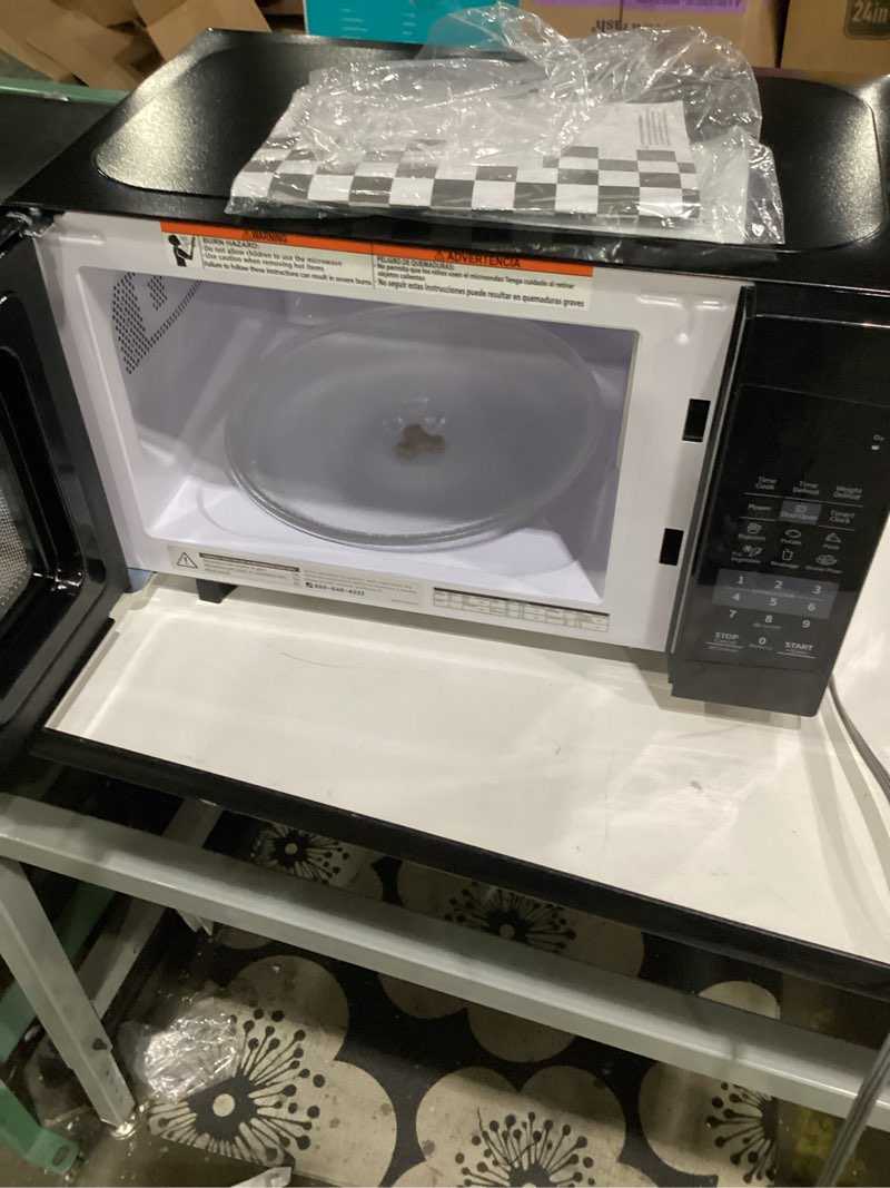 Condition photo showing Good Condition for not tested**** comfee em720cpl-pmb countertop microwave oven with sound on/off, eco mode and easy one-touch buttons, 0.7 cu ft, black