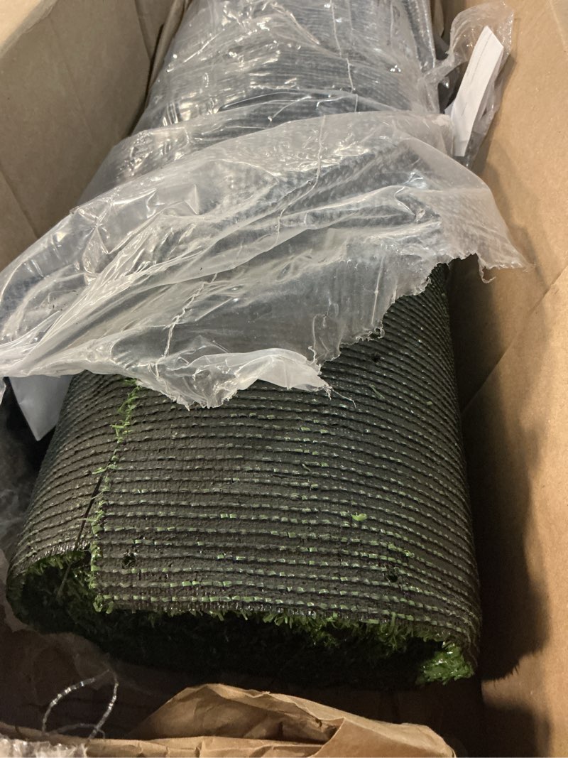 Condition photo showing As Is for ottomanson artificial grass turf 2'7" x 26' indoor outdoor faux grass rug with drainage holes, customizable with extra long size options, perfect for patio lawn balcony weddings photoshoot backdrop