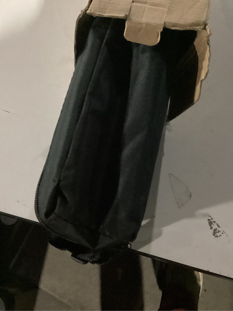 Condition photo showing item condition for Amazon Basics 60 inch Lightweight Tripod with Bag, Silver 60-in Tripod Only