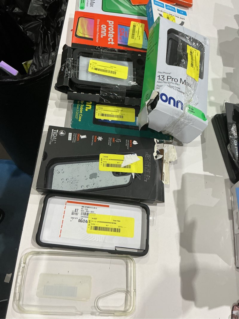 Condition photo showing As Is for assorted cellphone/tablet/laptop case covers & accessories