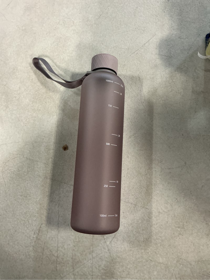 Condition photo showing Good Condition for kivy slim water bottle 32oz [lightweight & shatterproof] - reusable tritan water bottle - leak proof bottle for women & men - no spill - dishwasher safe water bottle bpa free 32oz purple taupe