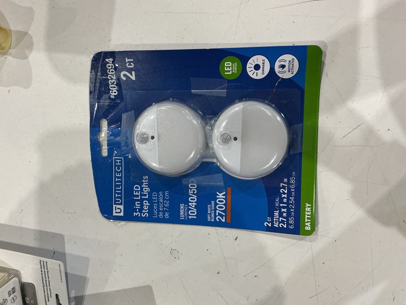 Condition photo showing As Is for utilitech 2 -pack white led motion sensor auto on/off night light
