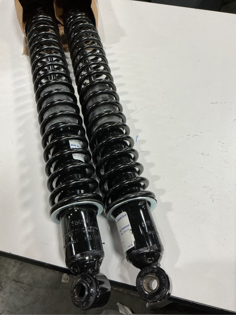 Condition photo showing Good Condition for monroe load adjusting 58654 suspension shock absorber and coil spring assembly pack of 2