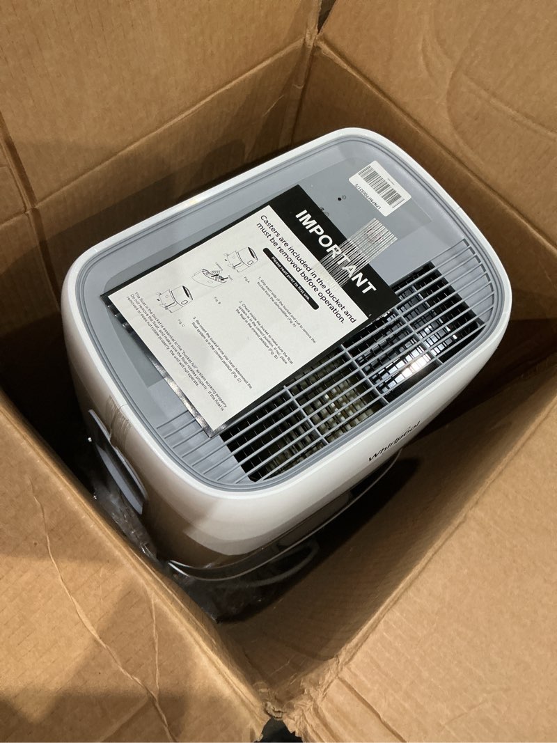 Condition photo showing Good Condition for whirlpool 50-pint portable dehumidifier for basement, garage, and living room, 115v, dehumidifier for rooms up to 4500 sq. ft. with energy star certification, auto-shutoff, and timer in white 50 pint bright white