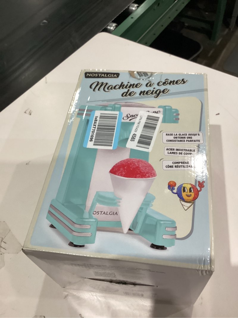 Condition photo showing As Is for Nostalgia Retro Snow Cone Machine – Single-Serve Countertop Size – Shaved Ice Maker for Snow Cones, Slushies, & Hawaiian Ice - Includes Reusable Plastic Cup – Aqua Single Serve Retro Aqua