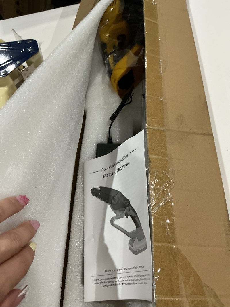 Condition photo showing As Is for (item similar))electric chainsaw