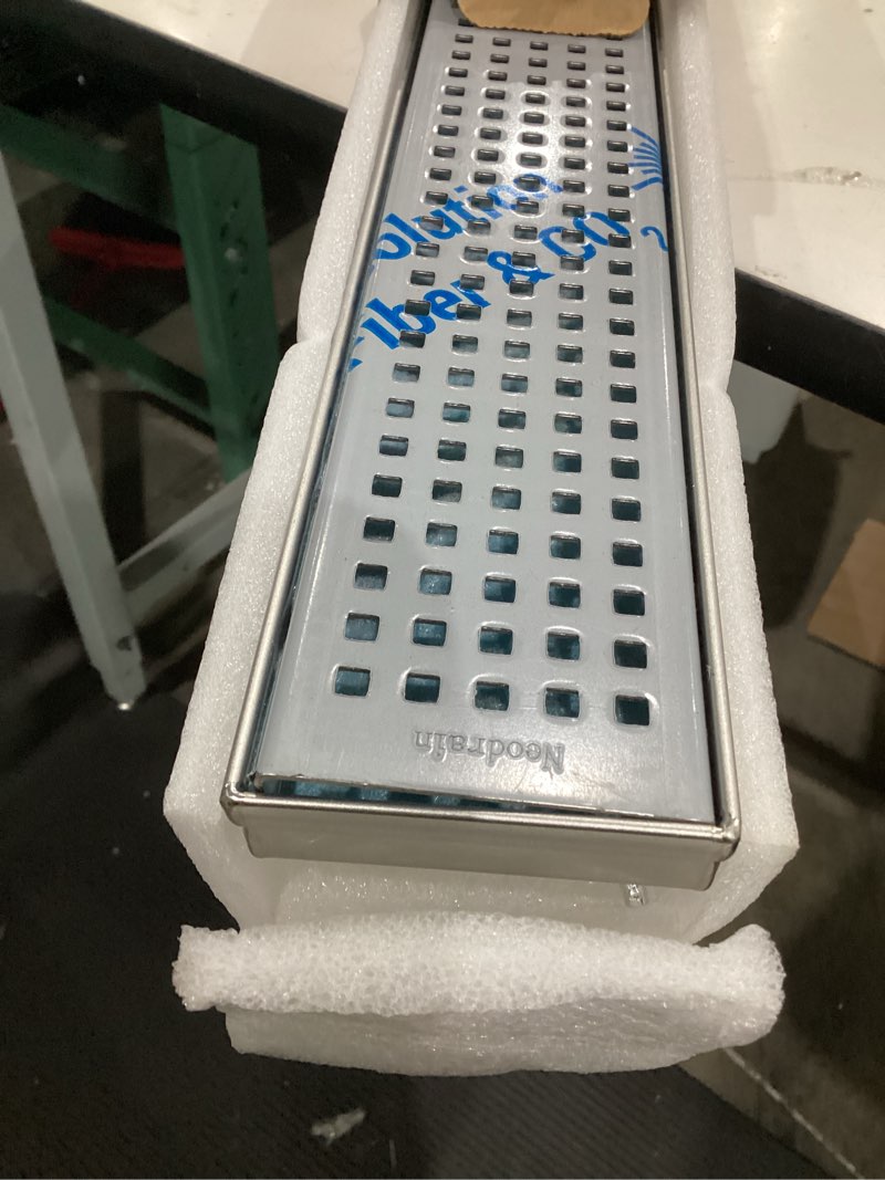 Condition photo showing Good Condition for neodrain 48-inch linear shower drain with removable quadrato pattern grate,brushed 304 stainless steel rectangle shower floor drainr, linear drain with leveling feet,hair strainer stainless 48 in