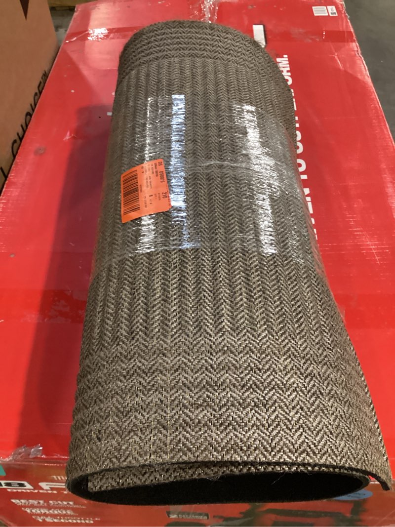 Condition photo showing As Is for premier rib 24 in. x 36 in. chevron taupe indoor/outdoor mat