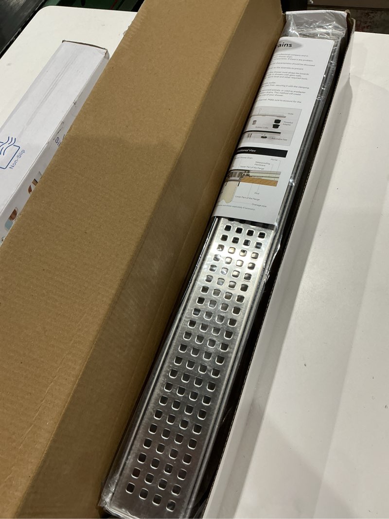 Condition photo showing Good Condition for webang 24 inch linear shower drain rectangular floor drain with accessories square hole pattern cover grate removable sus304 stainless steel cupc certified brushed brushed 24 inch