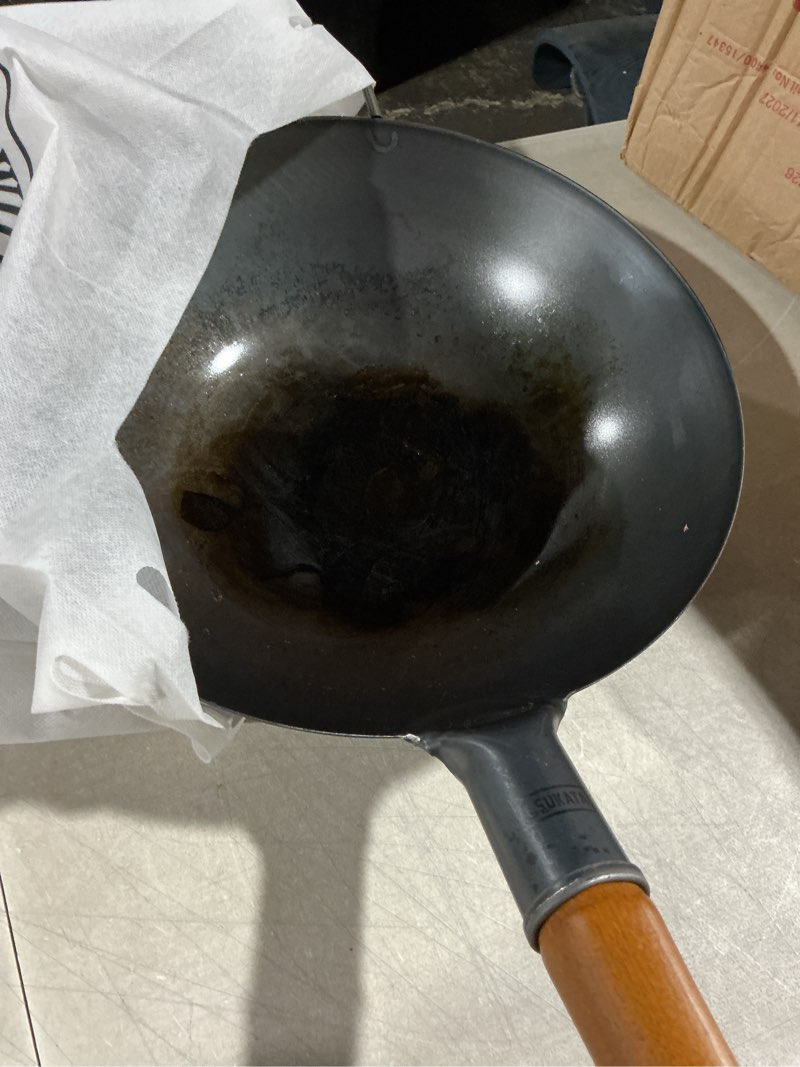 Condition photo showing As Is for yosukata 13.5" carbon steel wok pan – pre-seasoned flat bottom pow wok for stir fry, bbq, grill & camping – traditional japanese chinese cookware – compatible with induction, electric, gas, open fire