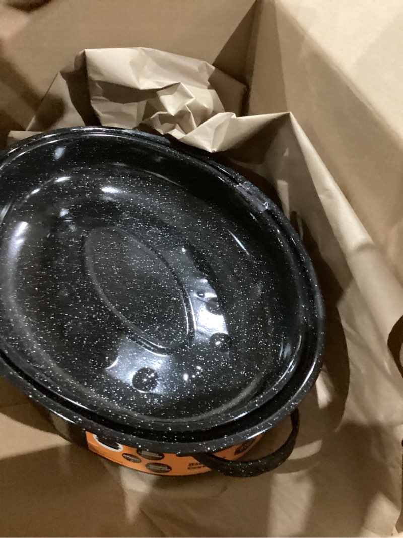 Condition photo showing Good Condition for Granite Ware 15 lb. Capacity (18 in.) Covered Oval Roaster, Speckled Black Enamel on Steel