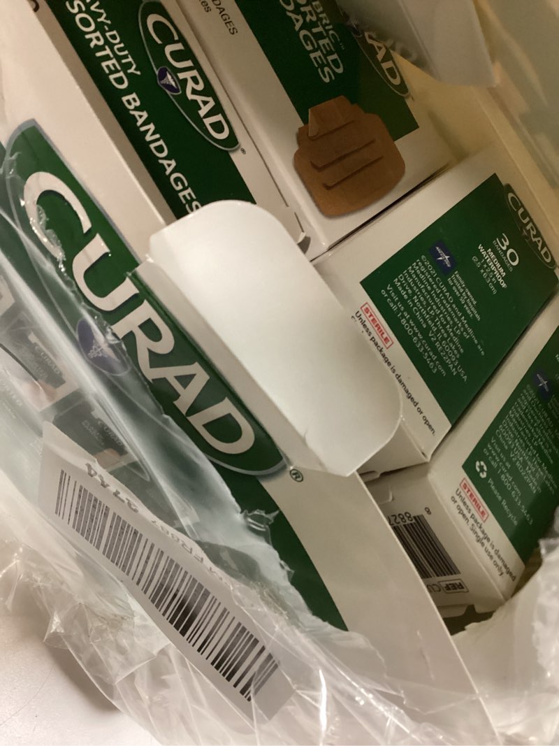 Condition photo showing Good Condition for CURAD Assorted Bandages Variety Pack, 300 Count, 6 Styles Including Antibacterial, Waterproof, Sheer, Plastic, Heavy Duty & Flex-Fabric, Protects Scrapes, Cuts & Burns, Latex-Free