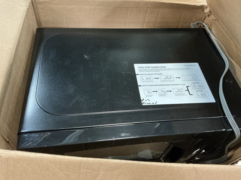 Condition photo showing Good Condition for COMFEE' EM720CPL-PMB Countertop Microwave Oven with Sound On/Off, ECO Mode and Easy One-Touch Buttons, 0.7cu.ft, 700W, Black