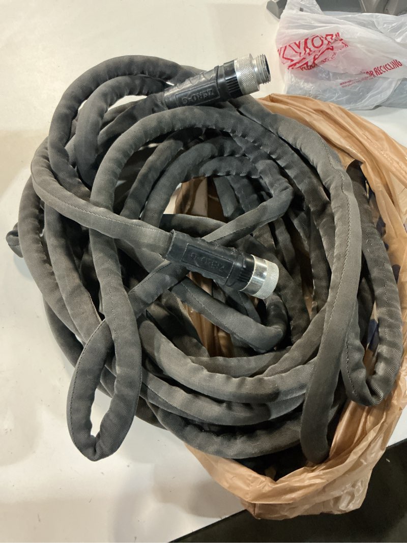 Condition photo showing As Is for zero-g teknor apex 5/8-in x 100-ft premium duty kink free woven hose