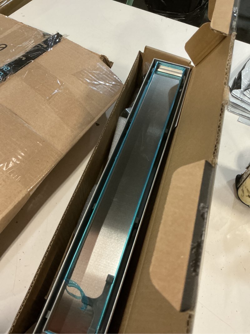 Condition photo showing Good Condition for shower drain, 2 in 1 linear shower drain 18 inch(brushed nickel), 304 stainless steel shower floor drain with tile insert grate,adjustable feet,hair filter brushed nickel 18in