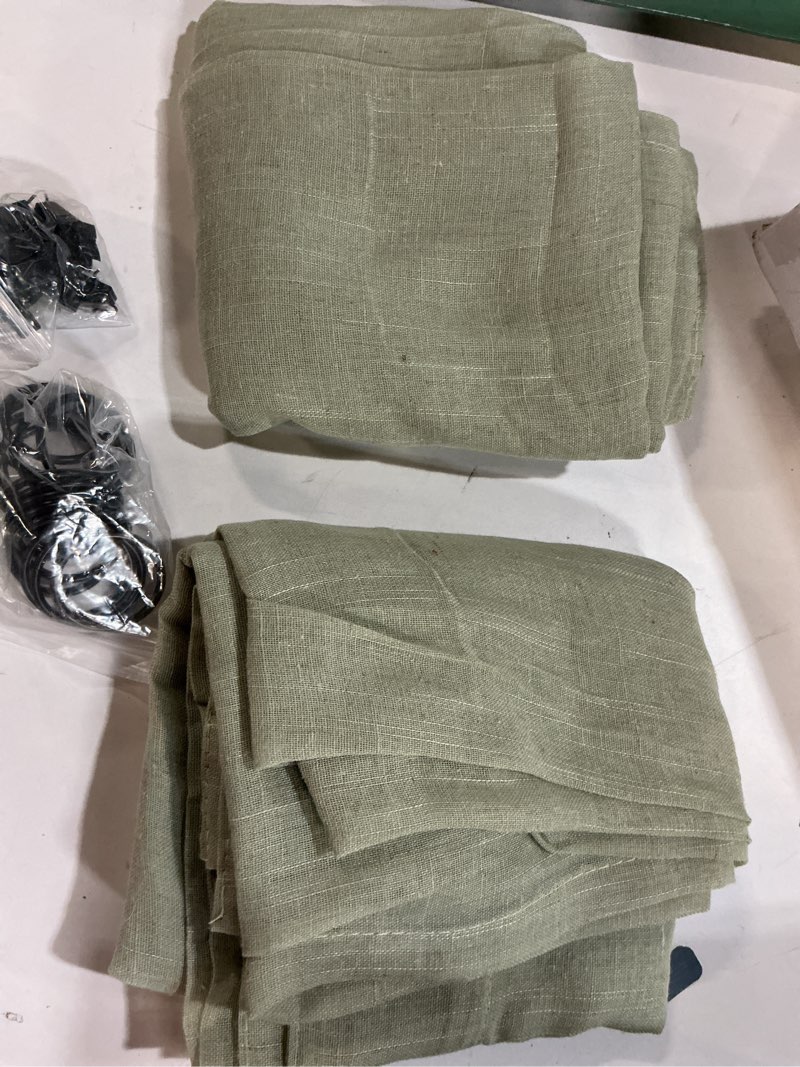 Condition photo showing Good Condition for Anmao Natural Linen Curtains for Living Room 63 Inch Length 2 Panels Set, Light Filtering Semi Sheer Window Curtain Drapes for Bedroom with Curtain Rings and Clips, 52 Inch Wide Each Panel, Sage 52"W x 63"L (Pack of 2) Sage Green