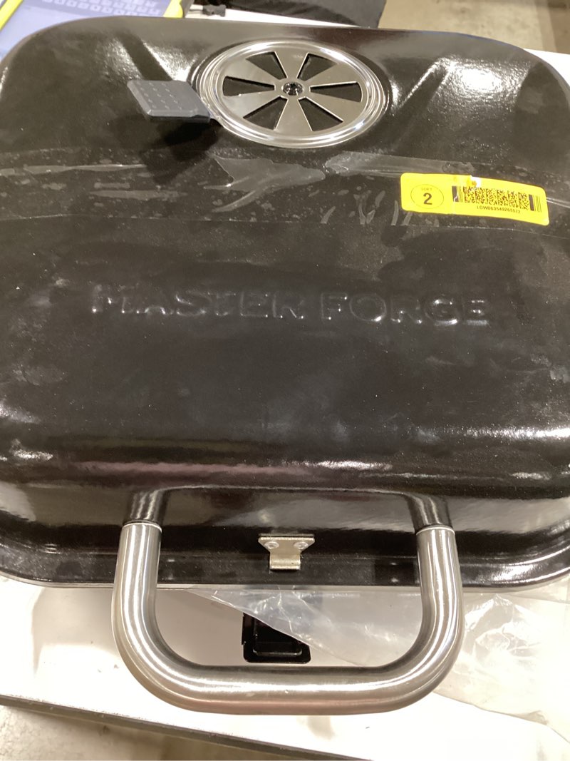 Condition photo showing As Is for master forge travel grill